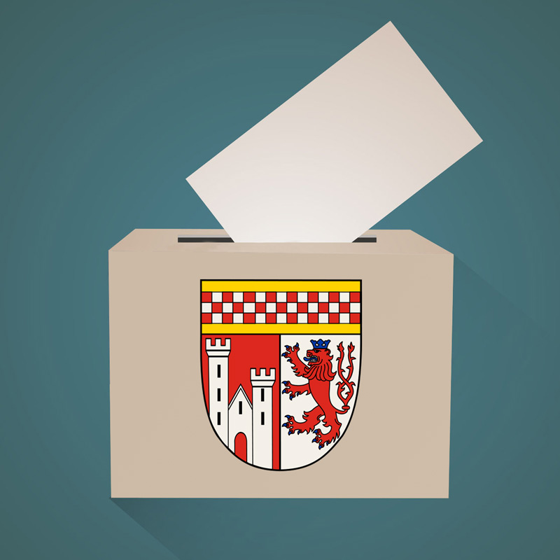 Symbolbild Wahlurne mit Wappen des Oberbergischen Kreises